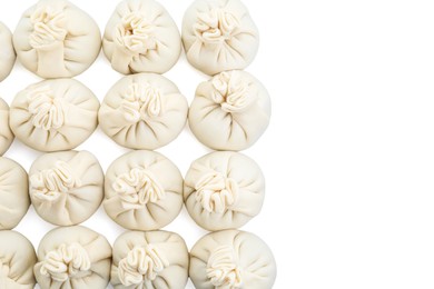 Uncooked khinkali (dumplings) isolated on white, top view. Georgian cuisine