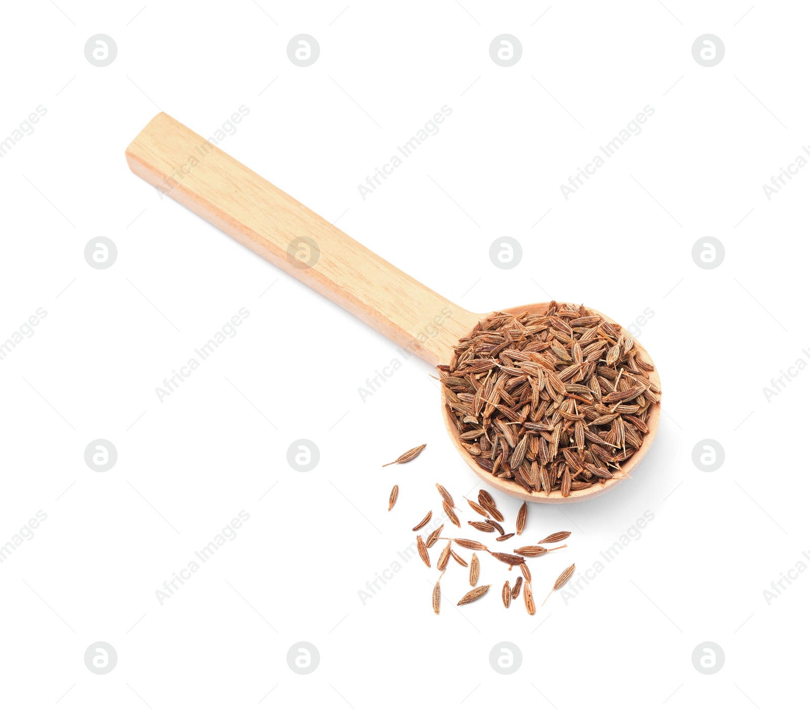 Photo of Spoon of aromatic caraway (Persian cumin) seeds isolated on white