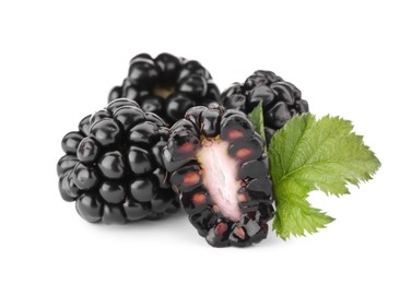 Tasty ripe blackberries and leaf on white background