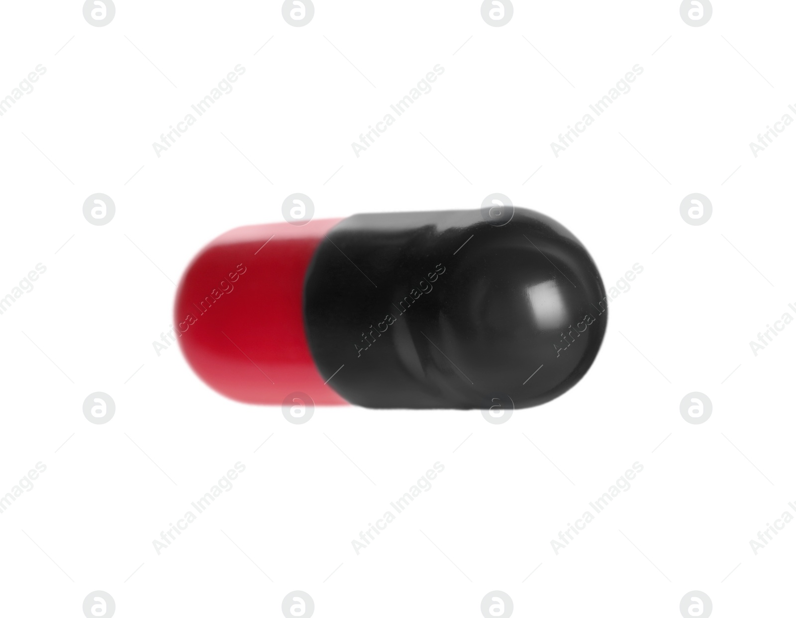 Photo of One pill isolated on white. Medicinal treatment