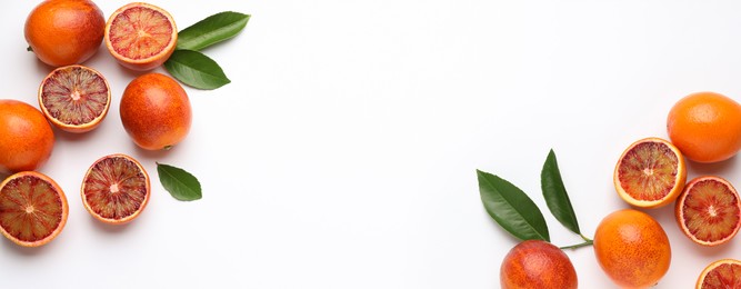 Image of Many ripe sicilian oranges and leaves on white background, flat lay with space for text. Banner design