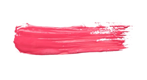 Photo of Abstract brushstroke of pink paint isolated on white