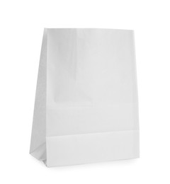 Photo of Blank paper bag isolated on white. Mockup for design