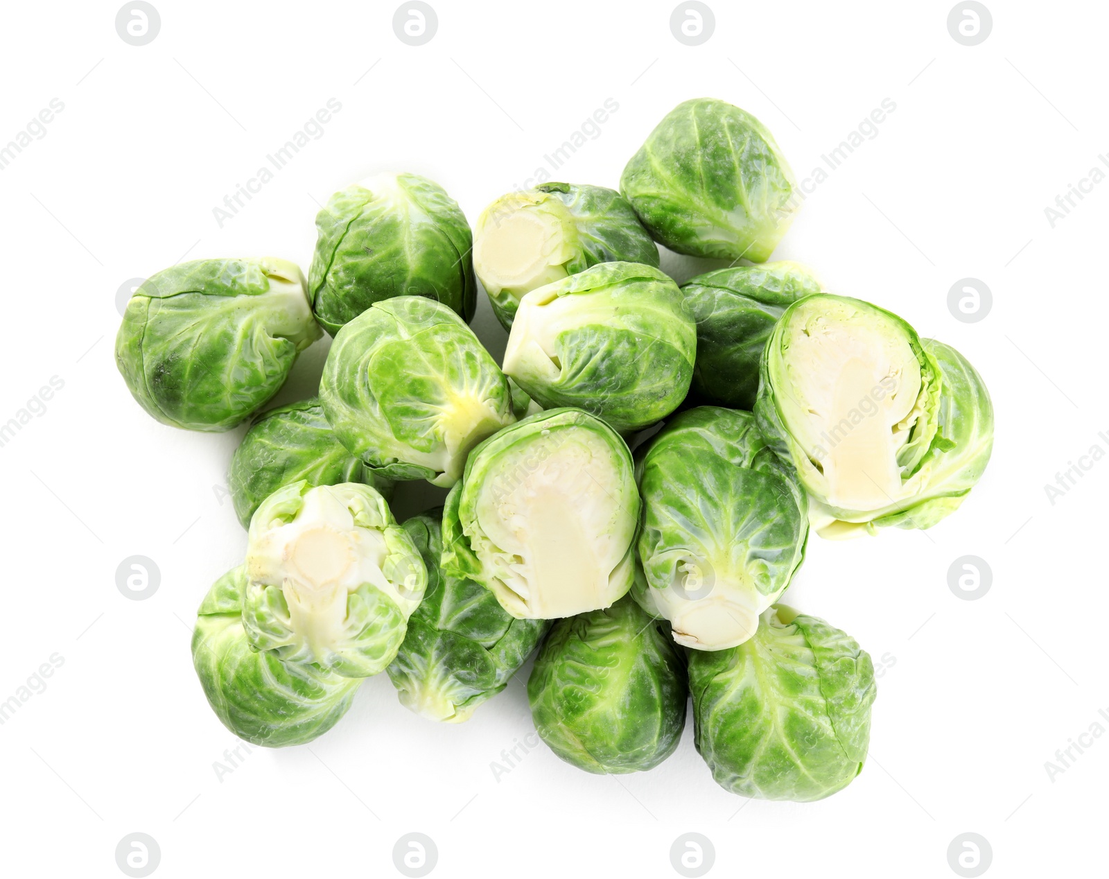 Photo of Pile of fresh Brussels sprouts isolated on white, top view