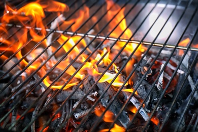 New modern barbecue grill with coals, closeup