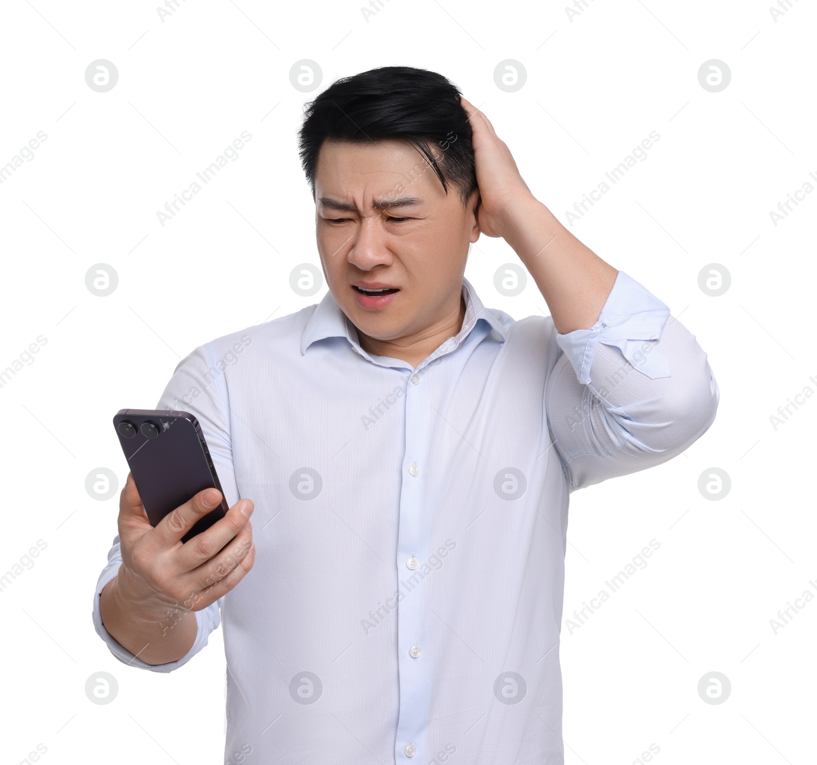 Photo of Confused businessman in formal clothes with phone on white background