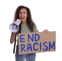 Emotional African American woman shouting into megaphone while holding sign with phrase End Racism on white background