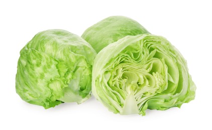 Whole and cut fresh green iceberg lettuces isolated on white