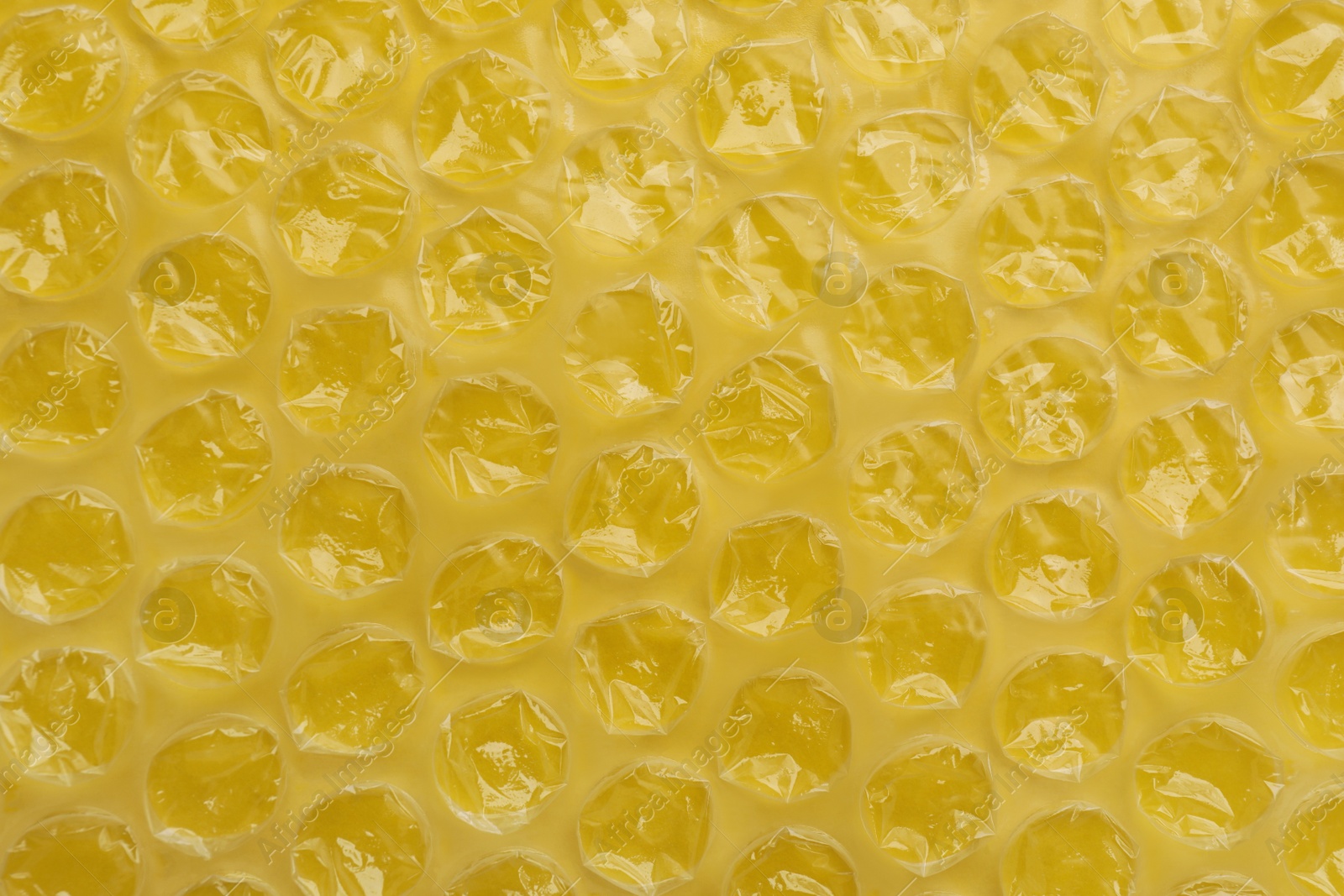 Photo of Texture of bubble wrap as background, top view