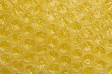 Photo of Texture of bubble wrap as background, top view