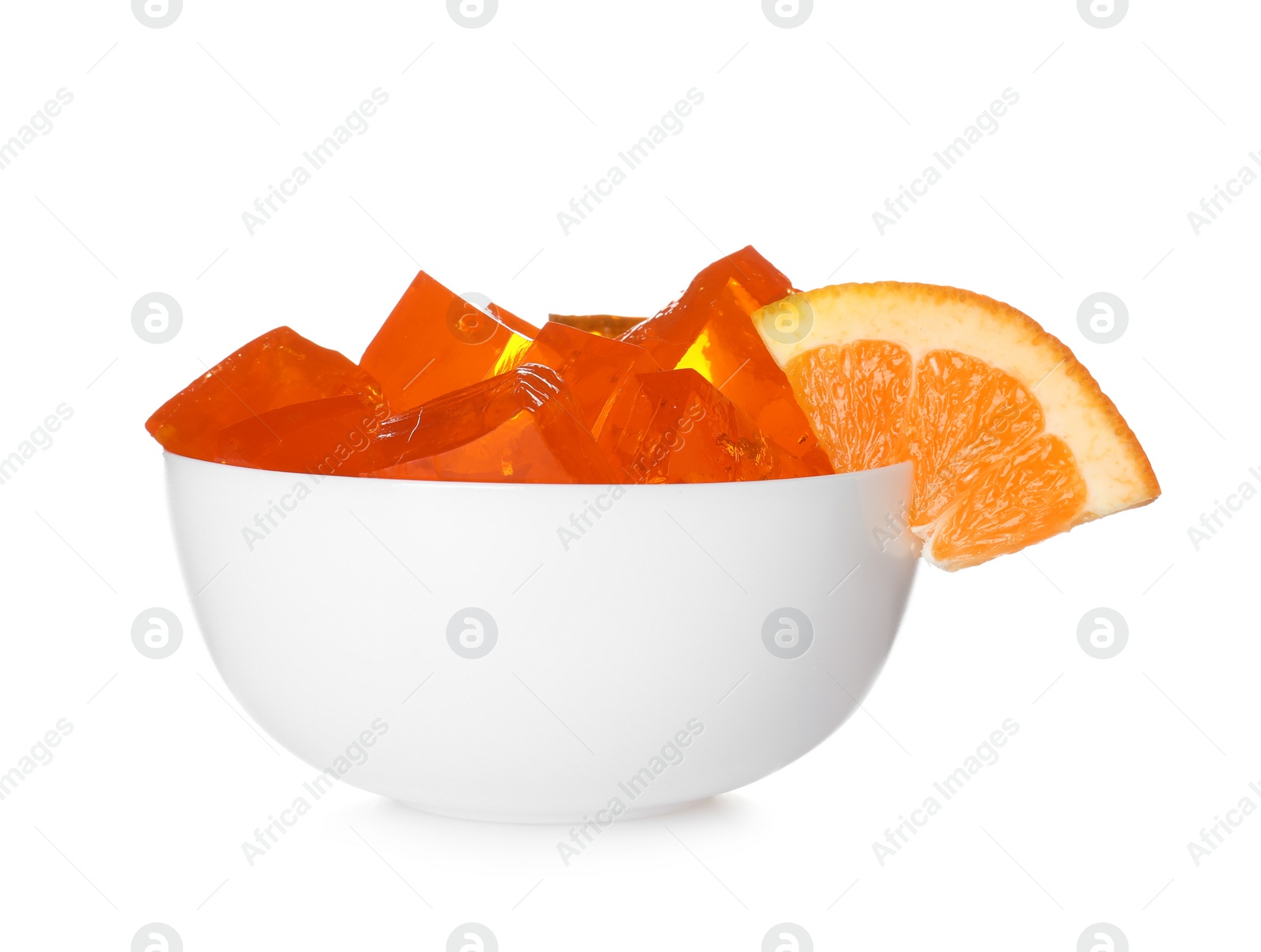 Photo of Bowl with tasty jelly cubes isolated on white