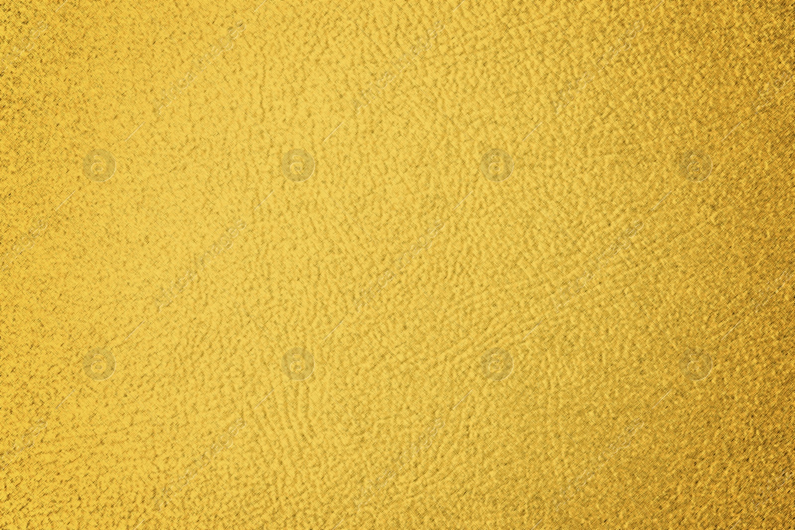 Image of Golden textured surface as background, closeup view