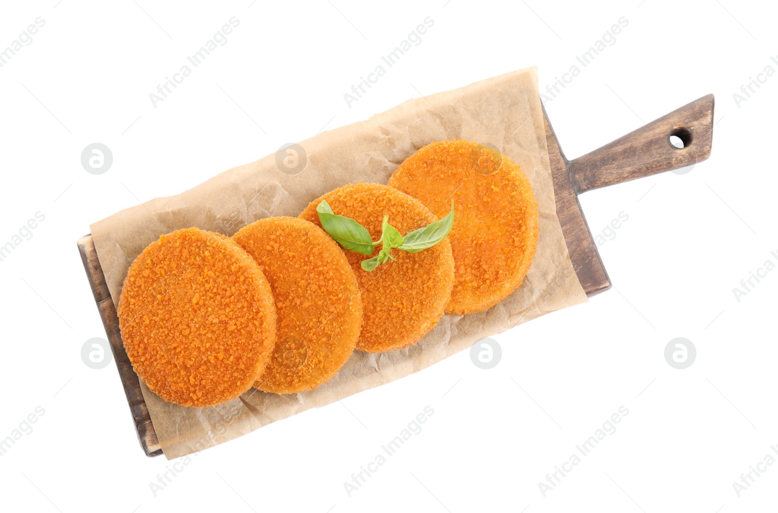 Photo of Delicious fried breaded cutlets with basil leaves isolated on white, top view