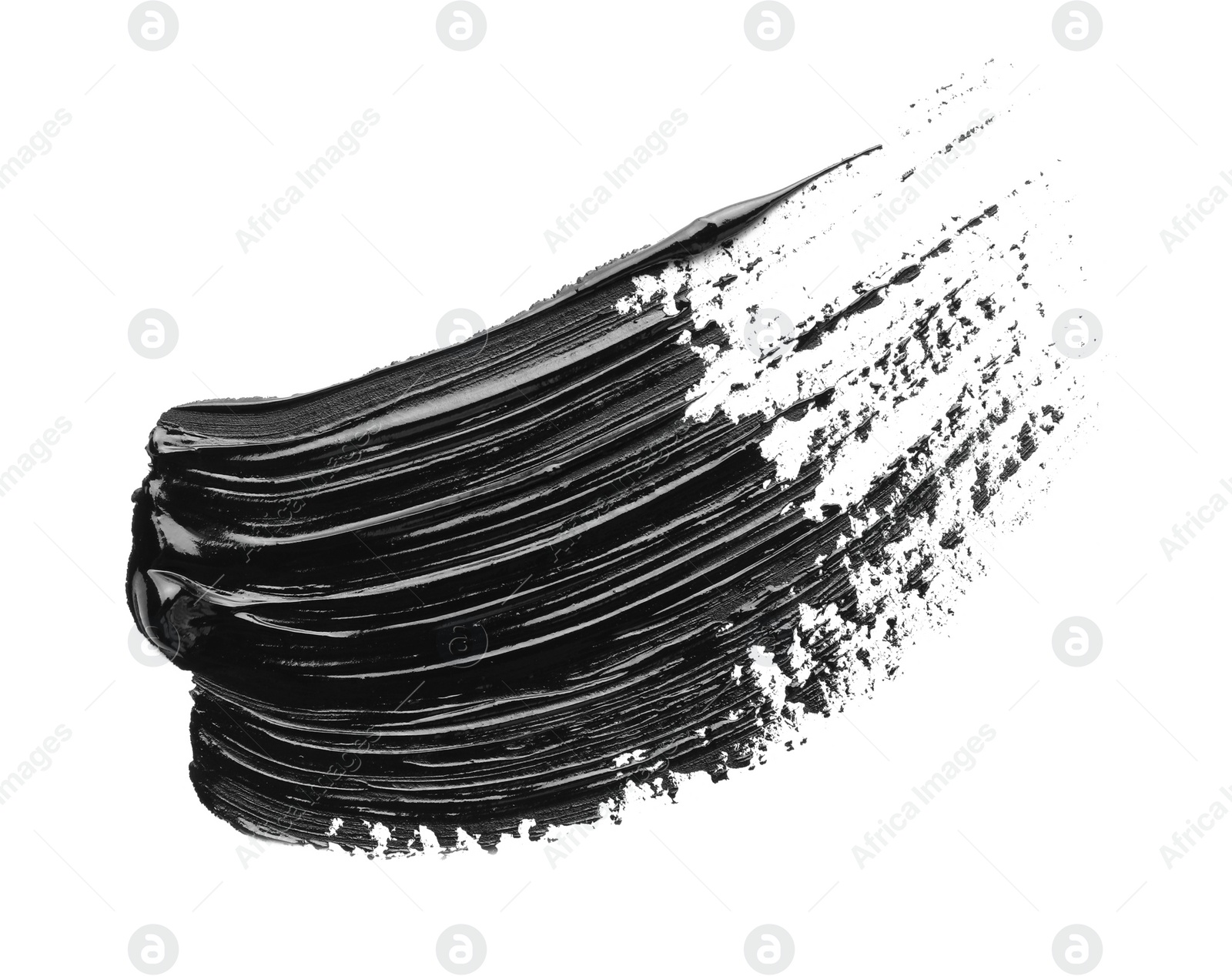 Photo of Brushstrokes of black oil paint on white background, top view