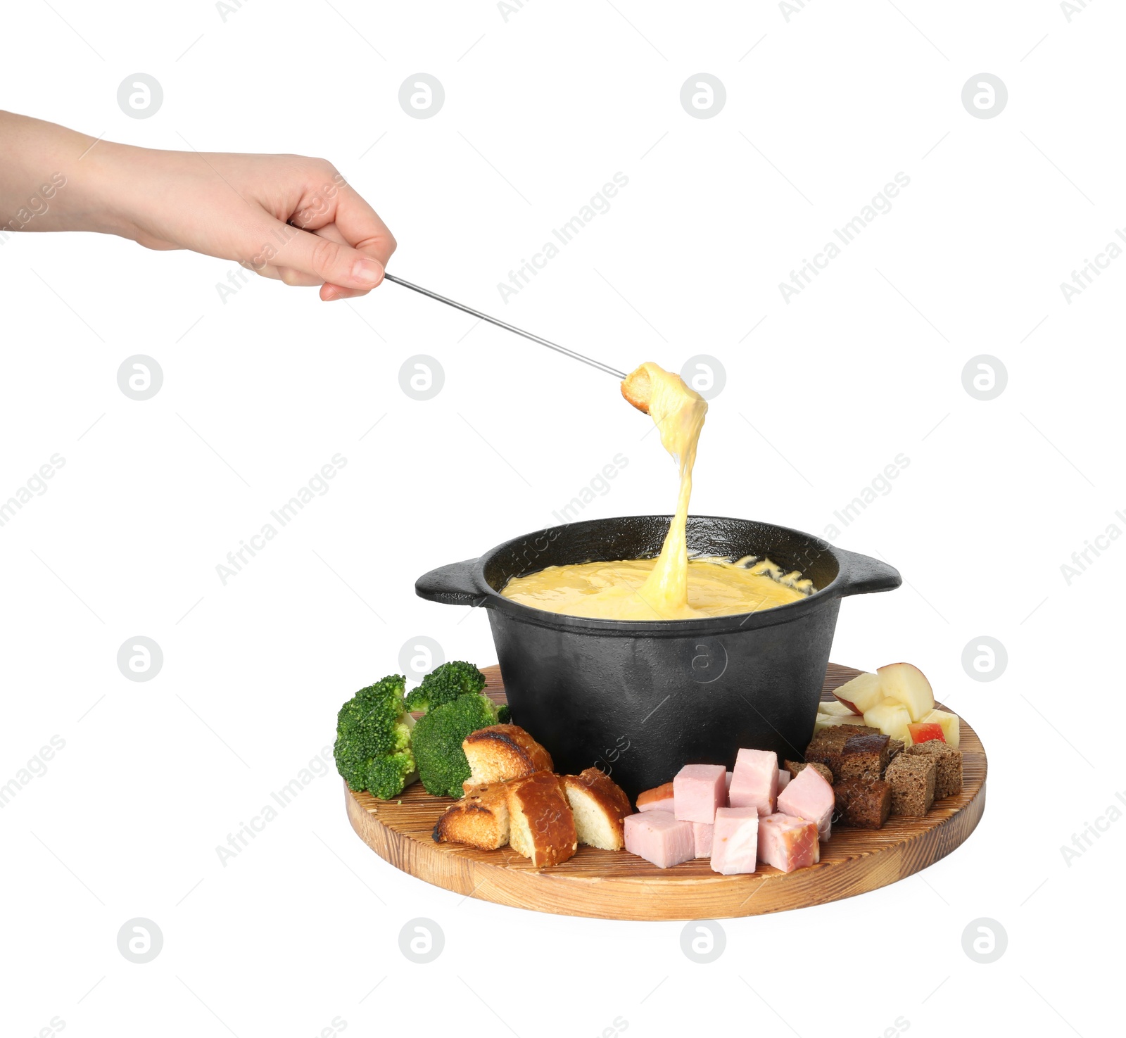 Photo of Woman dipping piece of bread into fondue pot with tasty melted cheese on white background, closeup