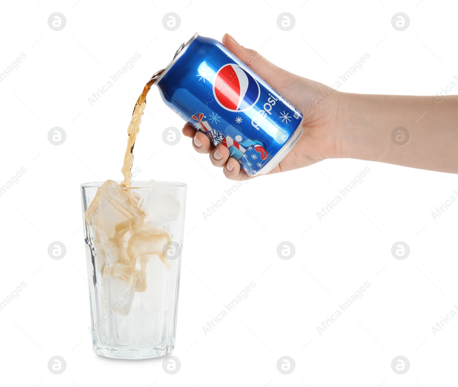 Photo of MYKOLAIV, UKRAINE - FEBRUARY 10, 2021: Woman pouring Pepsi into glass with ice on white background, closeup