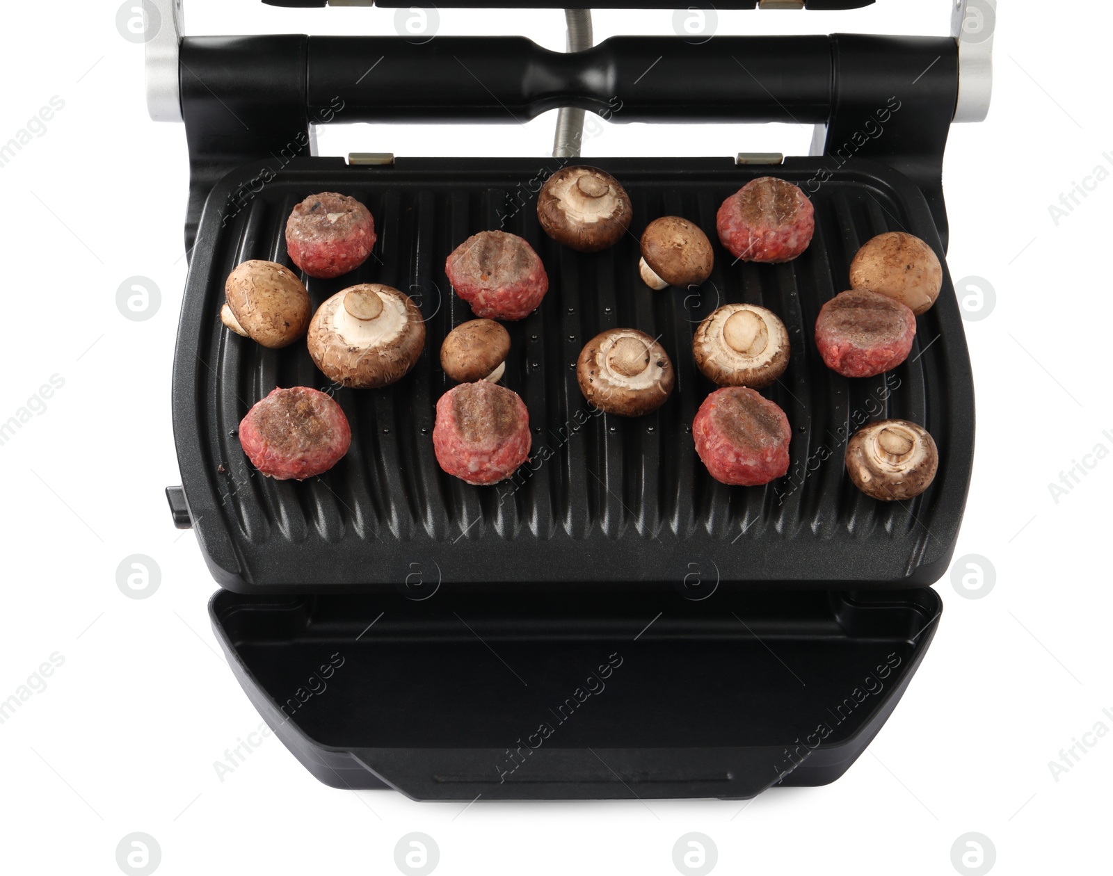 Photo of Electric grill with meat balls and mushrooms isolated on white