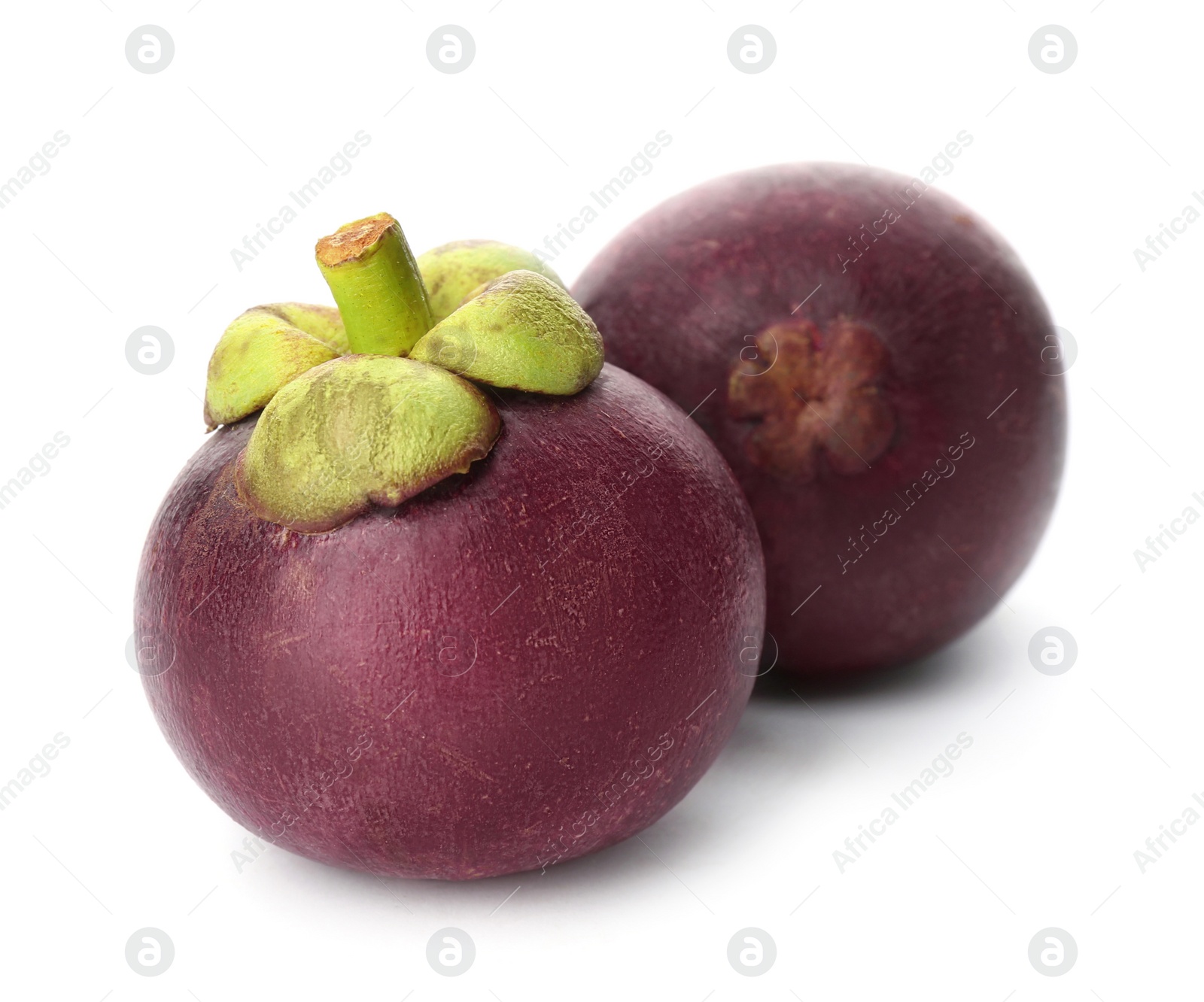 Photo of Delicious ripe mangosteen fruits on white background