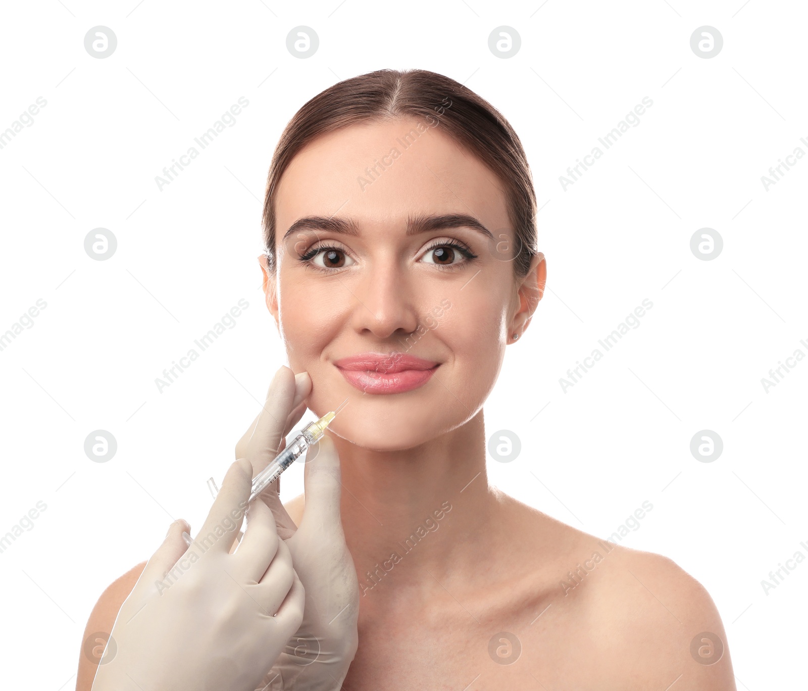 Photo of Beautiful woman getting facial injection on white background. Cosmetic surgery