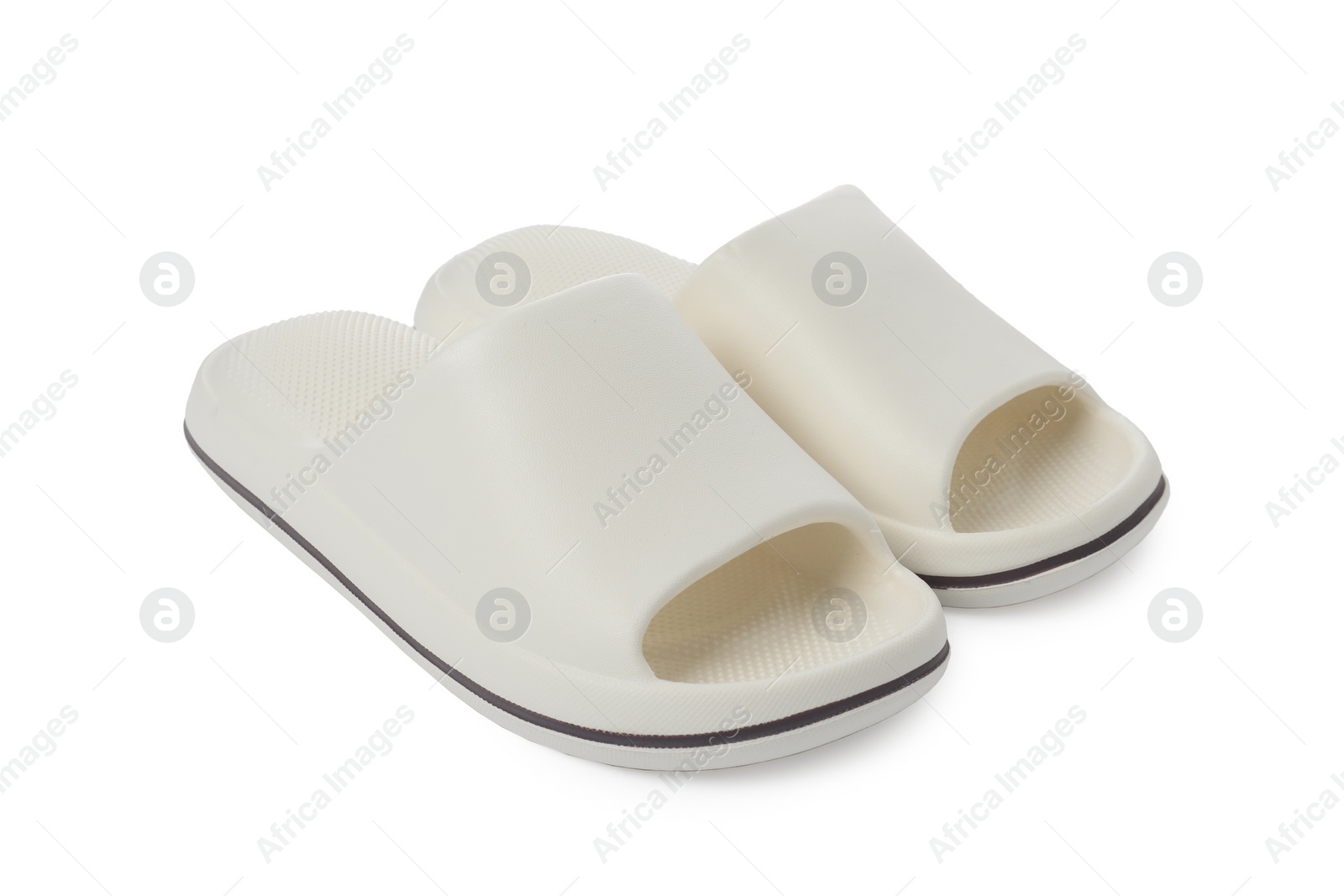 Photo of Pair of rubber slippers isolated on white