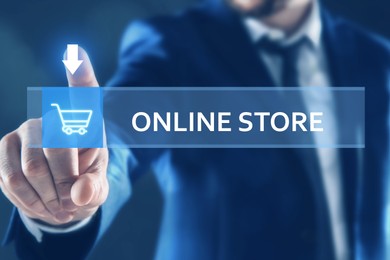 Image of Man pointing at search bar with phrase Online Store on virtual screen, closeup