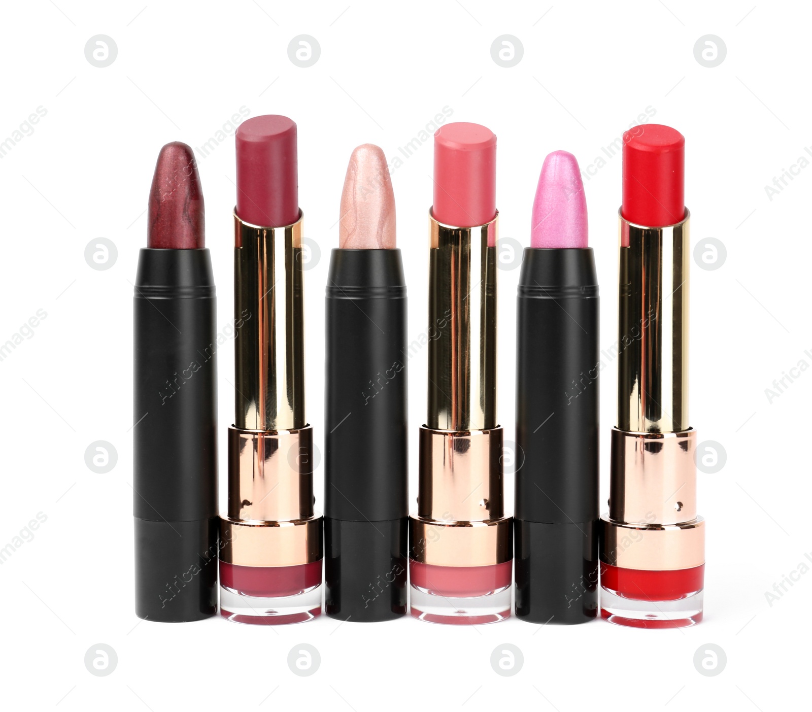 Photo of Set of colorful lipsticks isolated on white