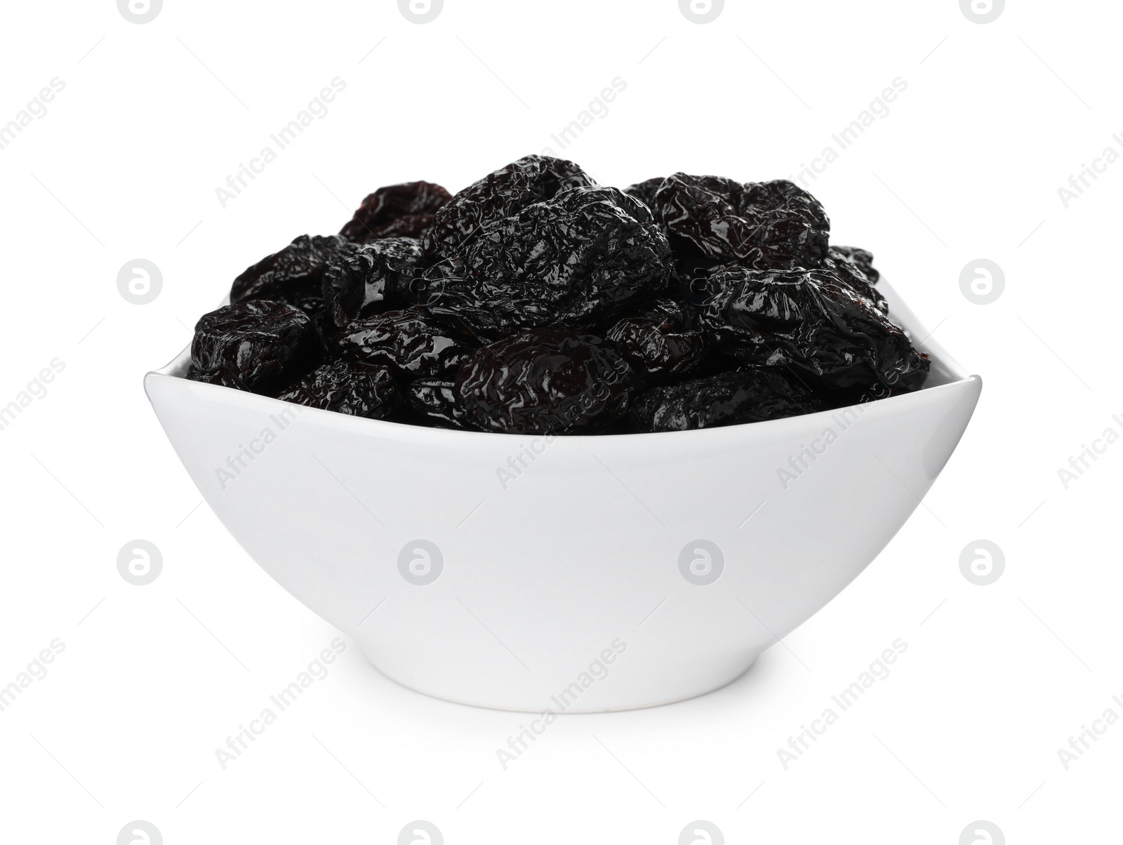 Photo of Bowl with sweet dried prunes isolated on white