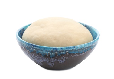 Photo of Bowl with raw dough on white background