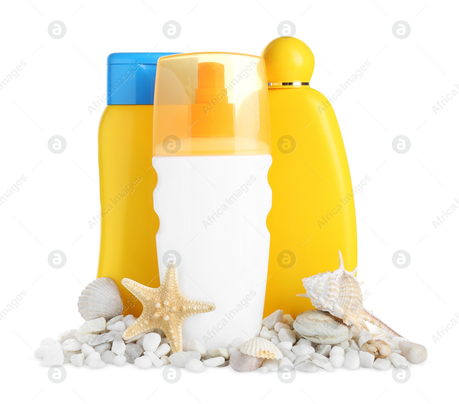 Photo of Different suntan products, seashells, starfish and stones on white background