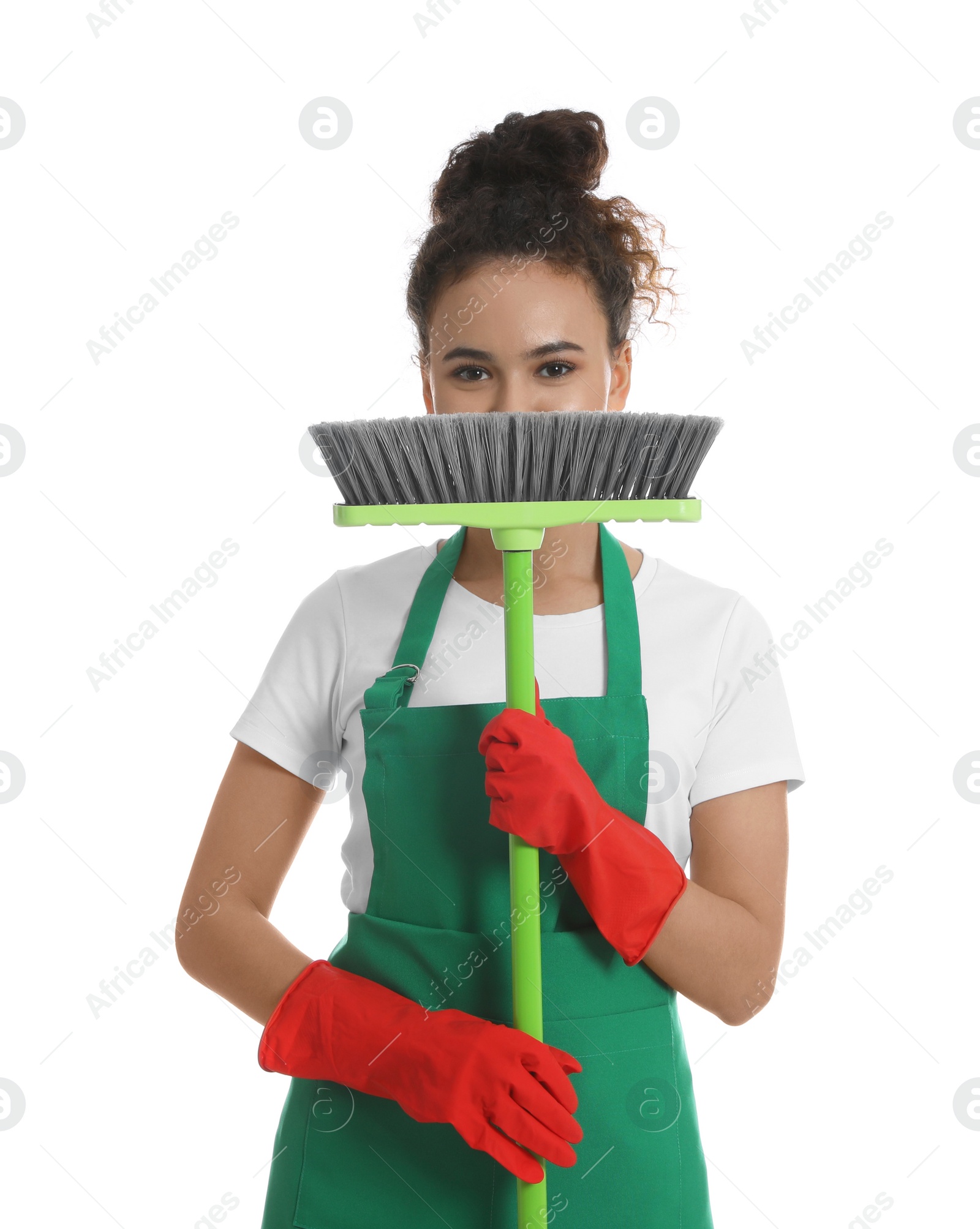 Photo of African American woman with green broom on white background