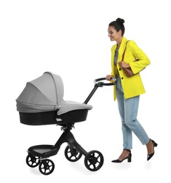 Photo of Happy young woman with baby stroller on white background