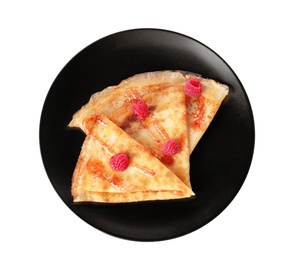 Photo of Tasty thin folded pancakes with raspberries on plate against white background, top view