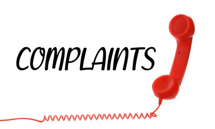 Corded telephone handset and word complaints on white background