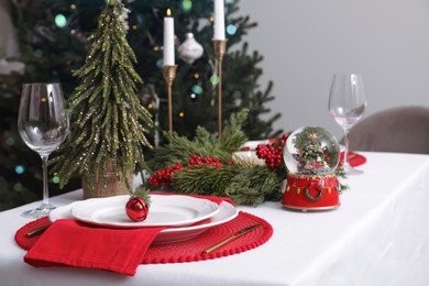 Photo of Luxury place setting with beautiful festive decor for Christmas dinner on white table. Space for text