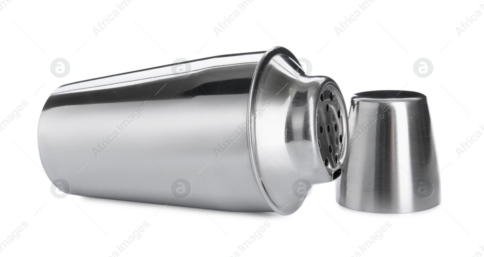 Photo of Metal cocktail shaker and cup isolated on white