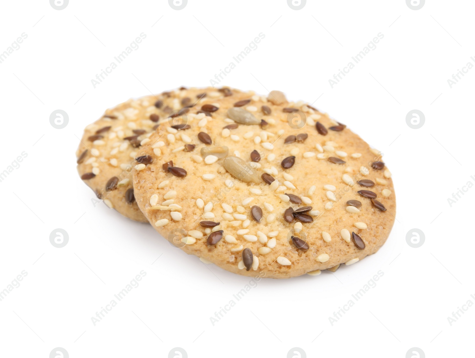 Photo of Round cereal crackers with flax, sunflower and sesame seeds isolated on white