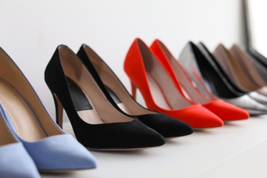 High heeled shoes on shelf in store