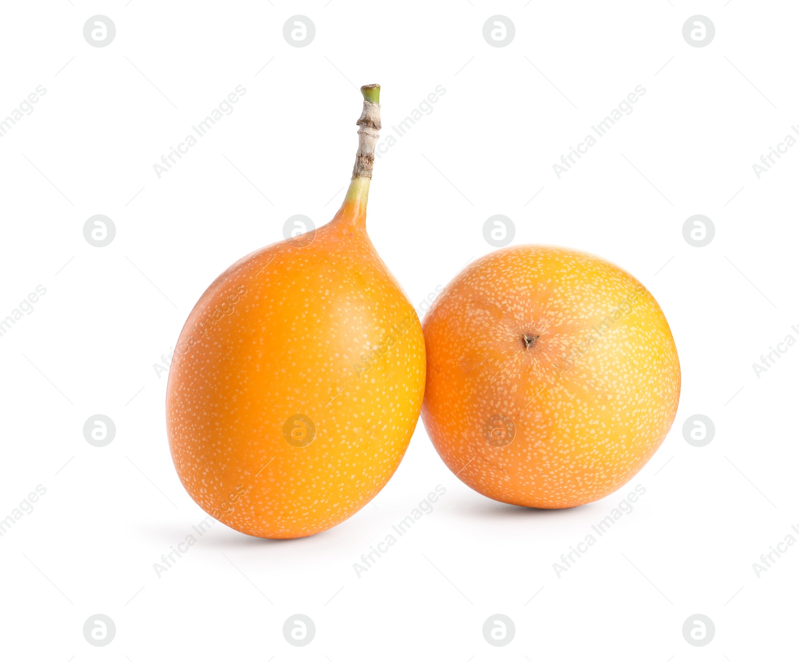 Photo of Whole delicious ripe granadillas on white background