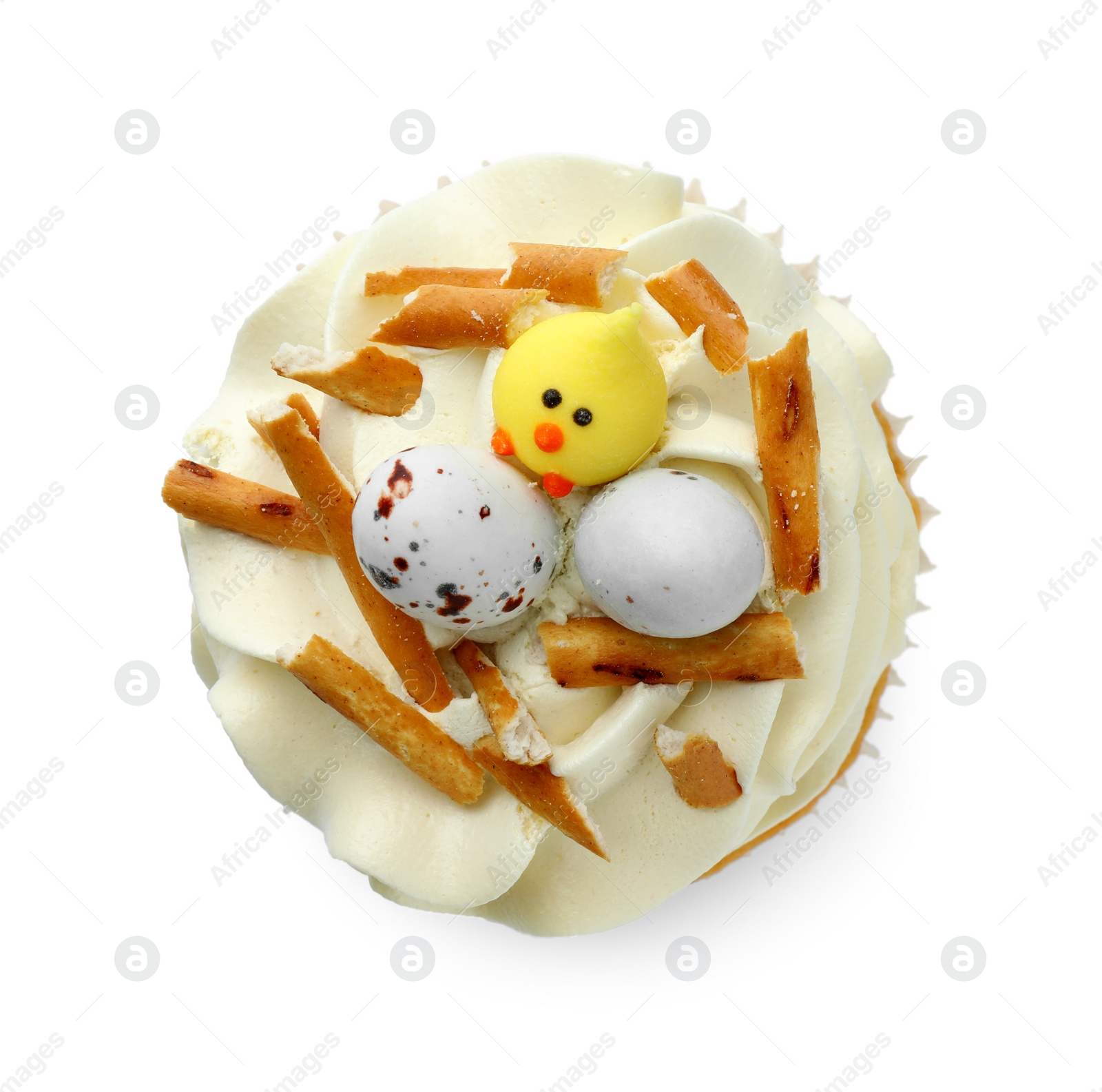 Photo of Tasty Easter cupcake with vanilla cream isolated on white, top view