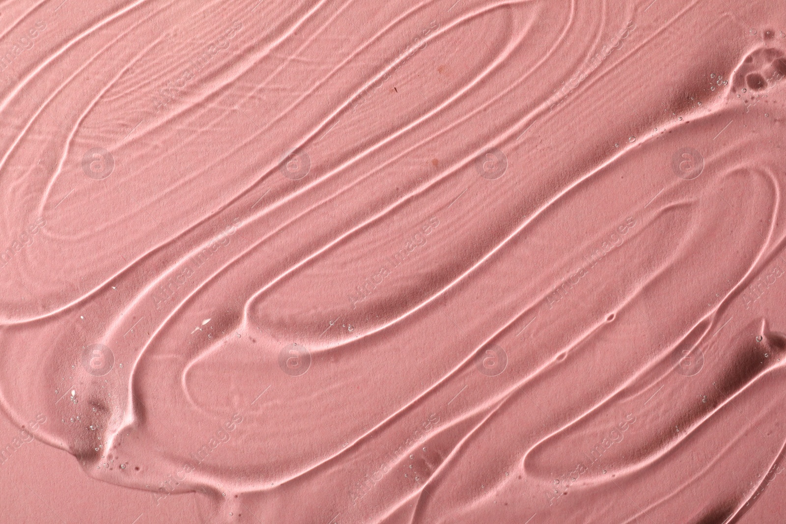 Photo of Cosmetic gel on pink background, top view