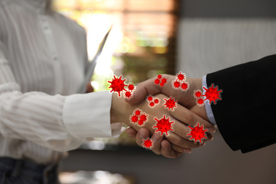 Image of Avoid handshakes during coronavirus outbreak. People greeting indoors, closeup