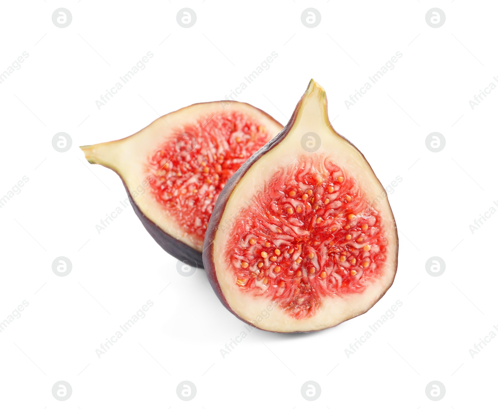 Photo of Halves of fresh fig isolated on white