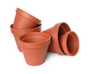 Empty clay flower pots isolated on white