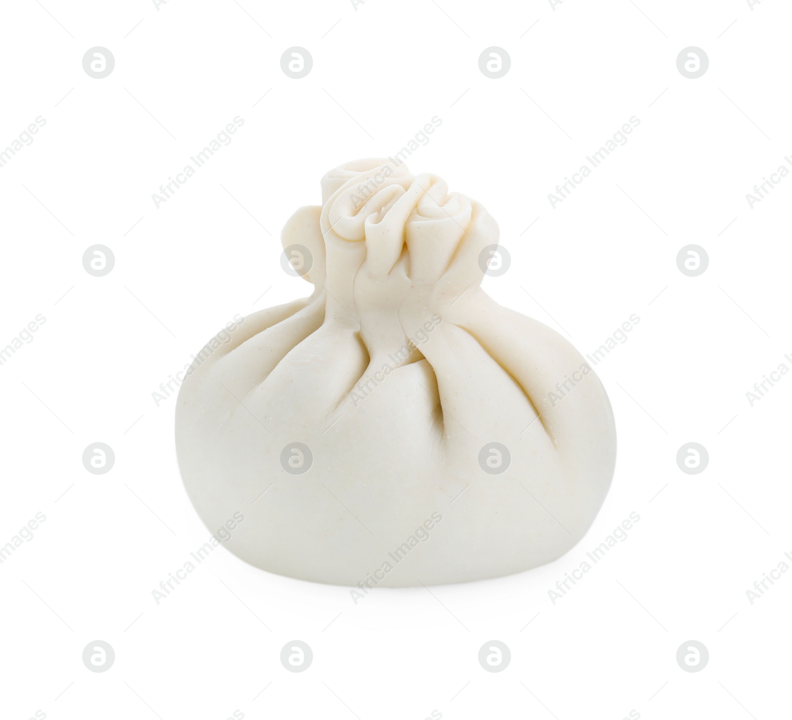 Photo of Uncooked khinkali (dumpling) isolated on white. Georgian cuisine