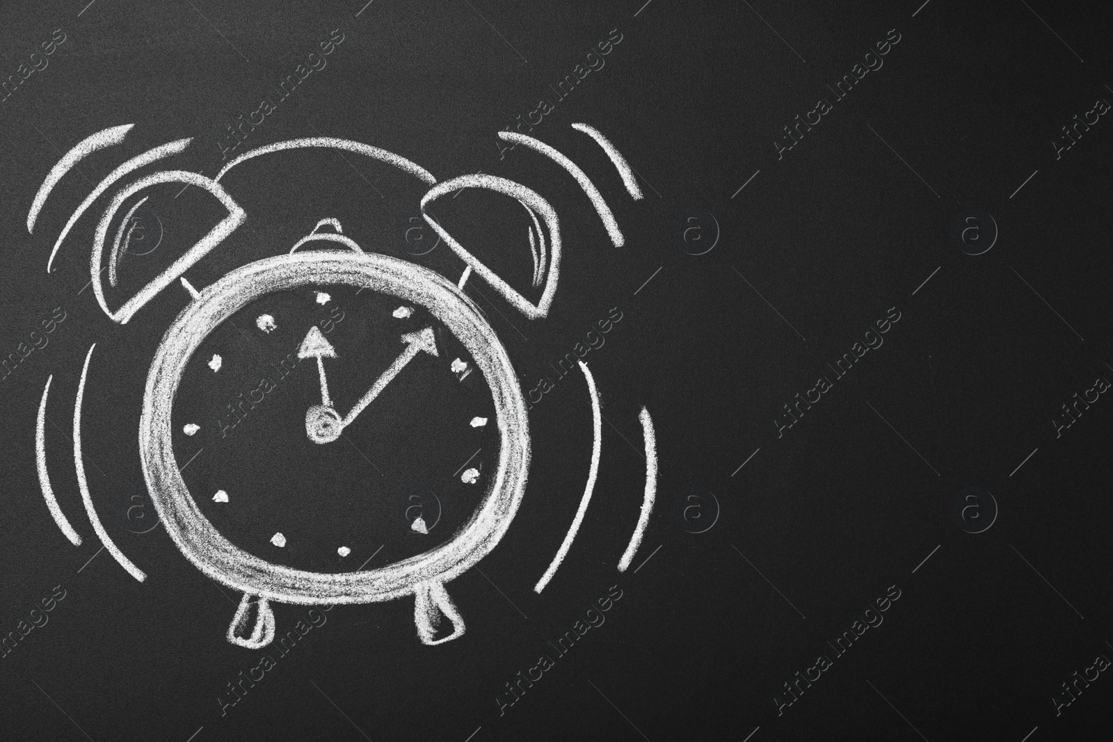 Photo of Drawn alarm clock on blackboard, space for text. School time