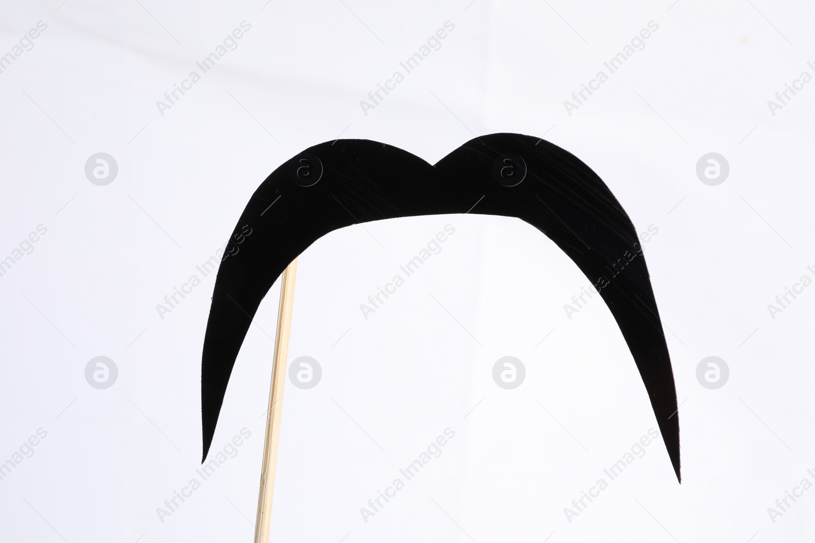 Photo of Fake paper mustache party prop against white background