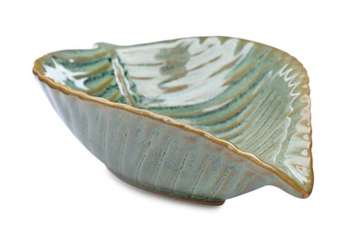 Beautiful green leaf shaped ceramic bowl on white background