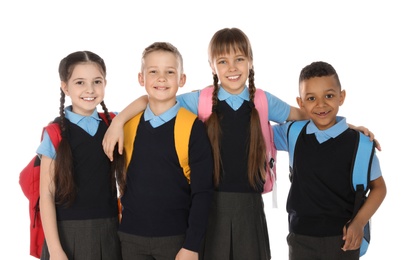 Photo of Portrait of cute children in school uniform on white background