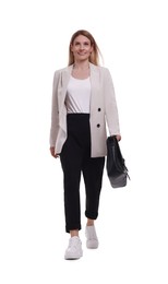 Photo of Beautiful happy businesswoman with briefcase walking on white background