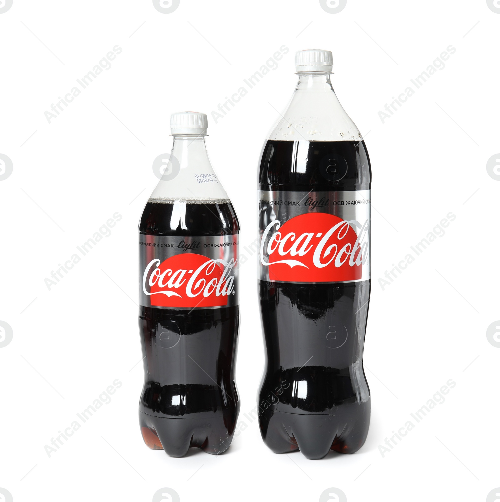 Photo of MYKOLAIV, UKRAINE - NOVEMBER 14, 2018: Bottles of Coca-Cola on white background